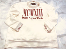Load image into Gallery viewer, Roman Numeral Cream Delta Sweatshirt
